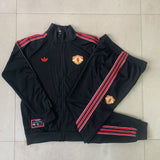 PANTALONES + SUDADERA MANCHESTER UNITED VI 25/26